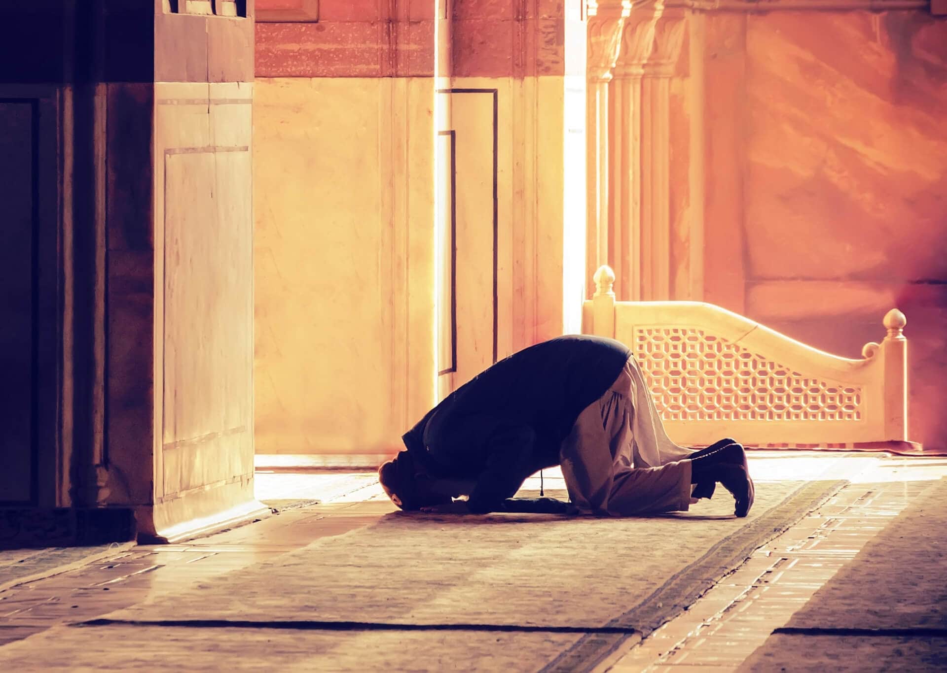The muslim prayer for god in the mosque